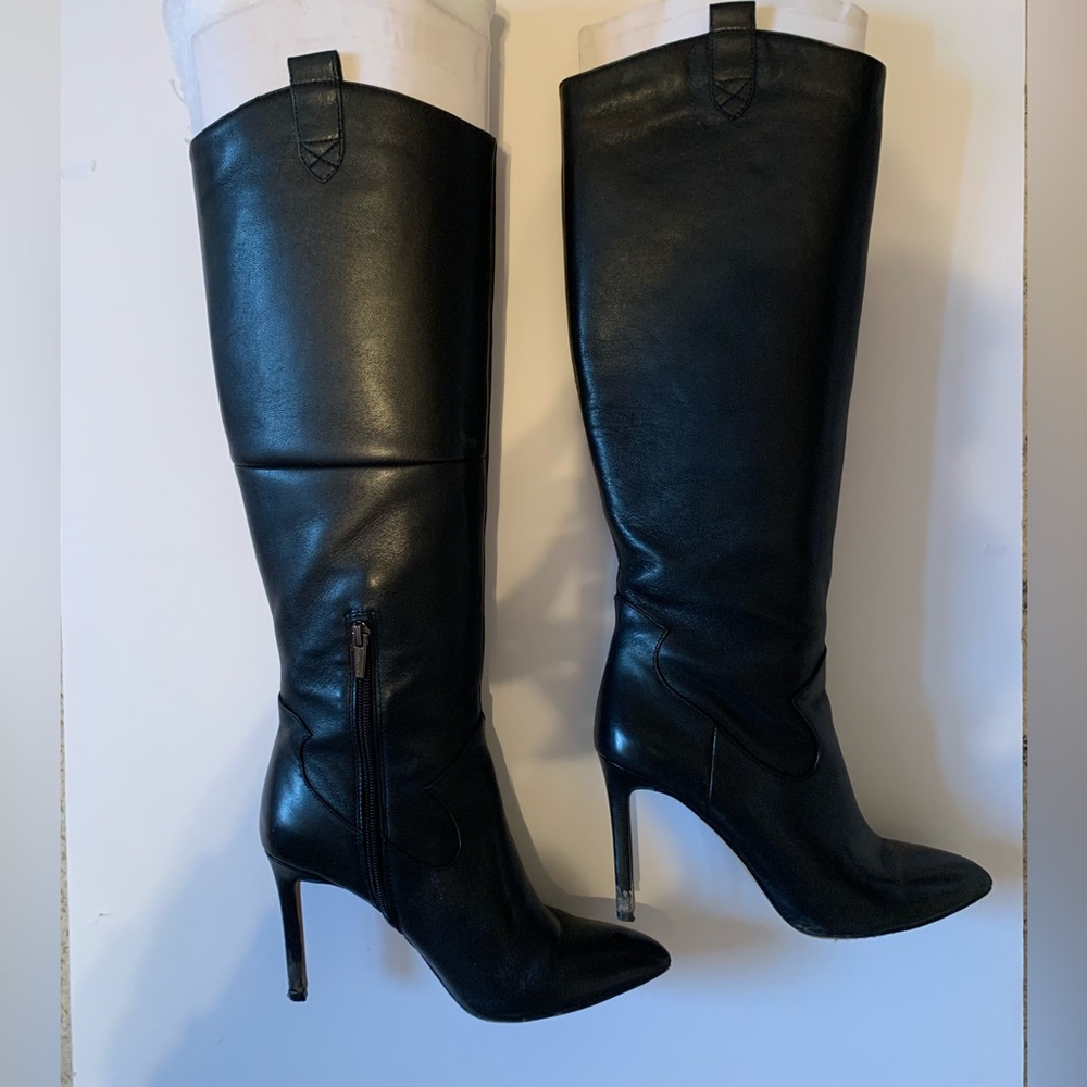 A Pair of Black Leather Vince Camuto knee high boots